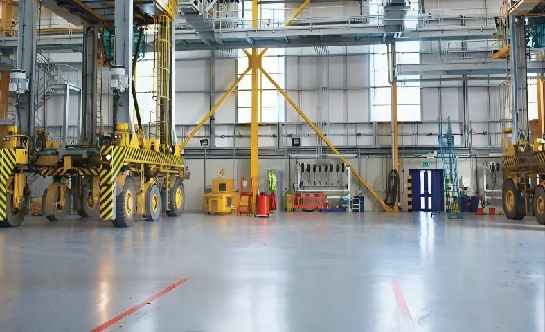 Why do some warehouses use color-coded safety equipment?